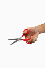 Hand holding a scissor.