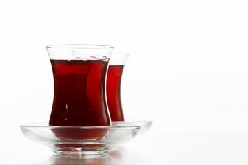 Turkish tea in traditional glass isolated on white background