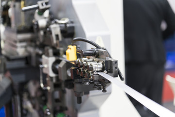 Naklejka premium Automatic stamping and bending machine control by CNC