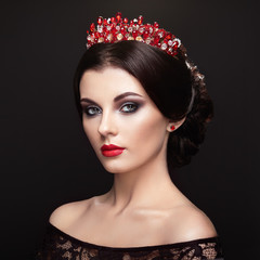 Fashion portrait of beautiful woman with tiara on head