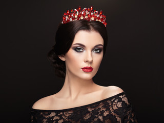 Fashion Portrait of Beautiful Woman with Tiara on head. Elegant Hairstyle. Perfect Make-Up and Jewelry. Red Lips © Oleg Gekman