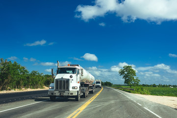 Front-View of Semi-Truck with Cargo Trailer Driving on a Highway