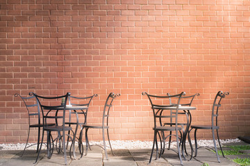 Afternoon coffee shop Sunlight shining through the garden chair. The warmth and relaxation of the customers. To drink coffee