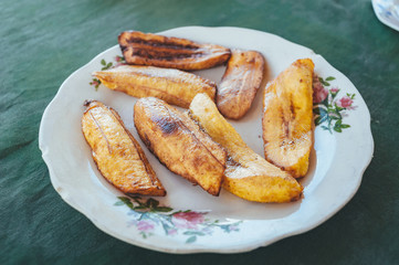 Typical cuban and asian dish - fried sliced banana. side view