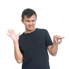 Asian young man standing and hand pointing. Isolated on white background with clipping path.Emotions and gay concept