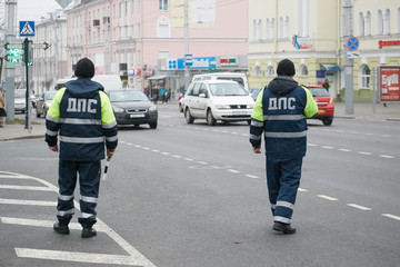 GOMEL, BELARUS - December 18, 2017: Officer of the road patrol service with a baton..