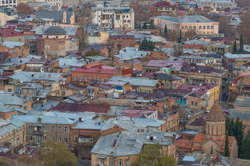 Fototapeta premium TBILISI, GEORGIA - DEC. 11, 2017 : Tbilisi old town in the morning taken from the hill