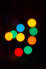 Christmas texture bokeh from a garland. New Year's bokeh. Garland lights