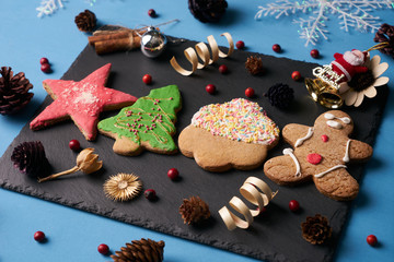 Winter Christmas background with gingerbread cookies