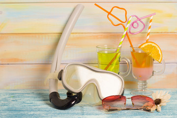 Exotic drinks and diving mask