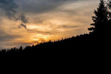 Sunset behid the hill