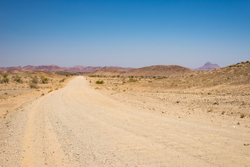 Road trip in the Namib desert, Namib Naukluft National Park, travel destination in Namibia. Travel adventures in Africa.