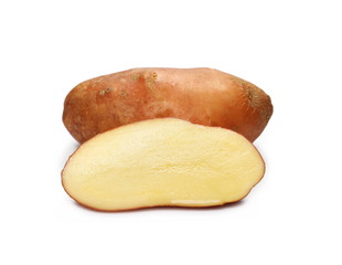 Fresh organic potatoes with slices isolated on white background