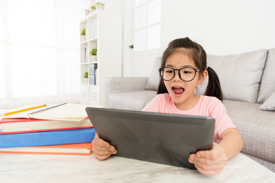female children holding mobile digital tablet
