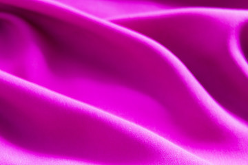 lilac purple abstract background from a fabric with selective focus