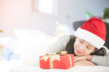 Portrait of young beautiful asian woman with christmas present boxes