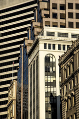 modern and traditional architecture tall buildings in city afternoon sunlight