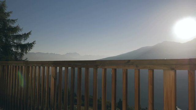 Swiss Alp Sunrise Behind Balcony Balustrade