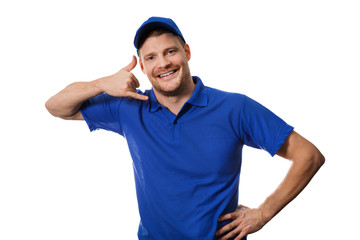 handyman services - worker in blue uniform making phone call gesture - obrazy, fototapety, plakaty