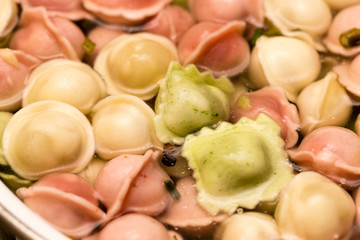 multicolored dumplings are cooked in the kitchen