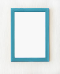 Light  wooden frame for picture hanging on white wall. Blank picture. Template for design