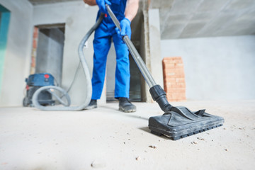 construction cleaning service. dust removal with vacuum cleaner - 185237870