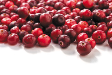 Fresh raw cranberries isolated on white background. closeup