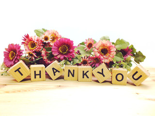 lettering thank you with artificial flowers bouquet