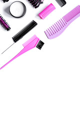 preparations for styling hair on white background top view