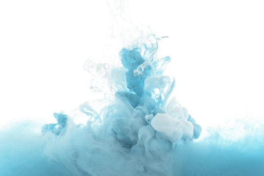 mixing of blue paint splashes isolated on white