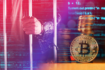 Handcuffed arrested Bitcoin thief