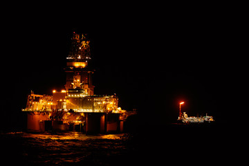 Fototapeta premium Offshore drilling by night time