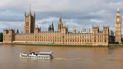 Fototapeta na wymiar Houses of Parliament, British seat of government at River Thames riverside, London, England