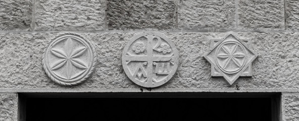 Symbols above the doors