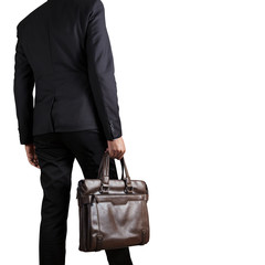 Businessman holding a briefcase isolated on white background with clipping part