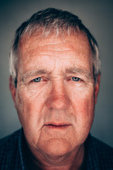 Close up face portrait Older depressed man