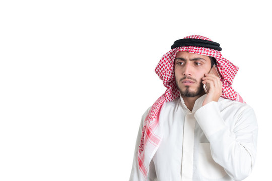 Young arab  buisnisman talking on the phone. isolated