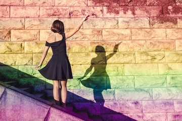 The LGBT community, the concept young girl lesbians with his shadow another girl