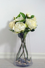 Beautiful white gardenia flower in glass vase