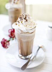 Iced Coffee latte with whipped cream and chocolate, Tall glass of ice coffee caffee latte whipped cream, summer, dessert