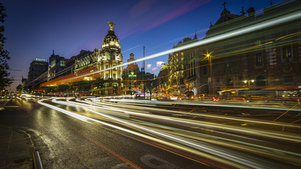 Fototapeta na wymiar Streetlights at Gran Via Madrid Spain