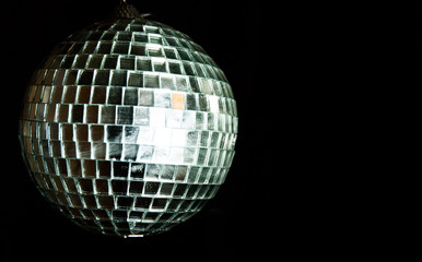 mirror ball on black background. with copy space.