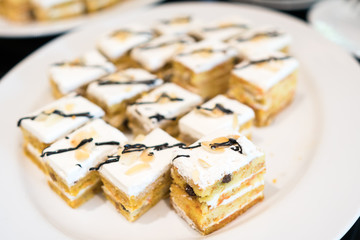 Plenty of cakes on White dish