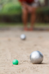 Boules and green jack ball in the match