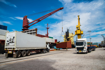 trailer and lorry trucking delivery container shipment from yard to the ship vessel in port terminal, the logistics transport services for the sea and land transportation - obrazy, fototapety, plakaty