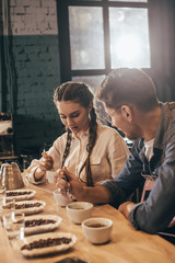 coffee shop workers checking coffee quality during coffee food function