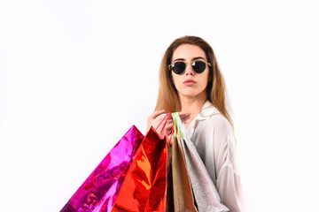 Girl in sunglasses with serious face isolated on white background