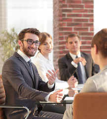 business team discussing new ideas at your Desk.