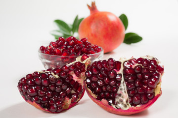 Pieces of pomegranate on a white background