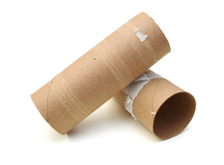 Two empty toilet rolls on white background